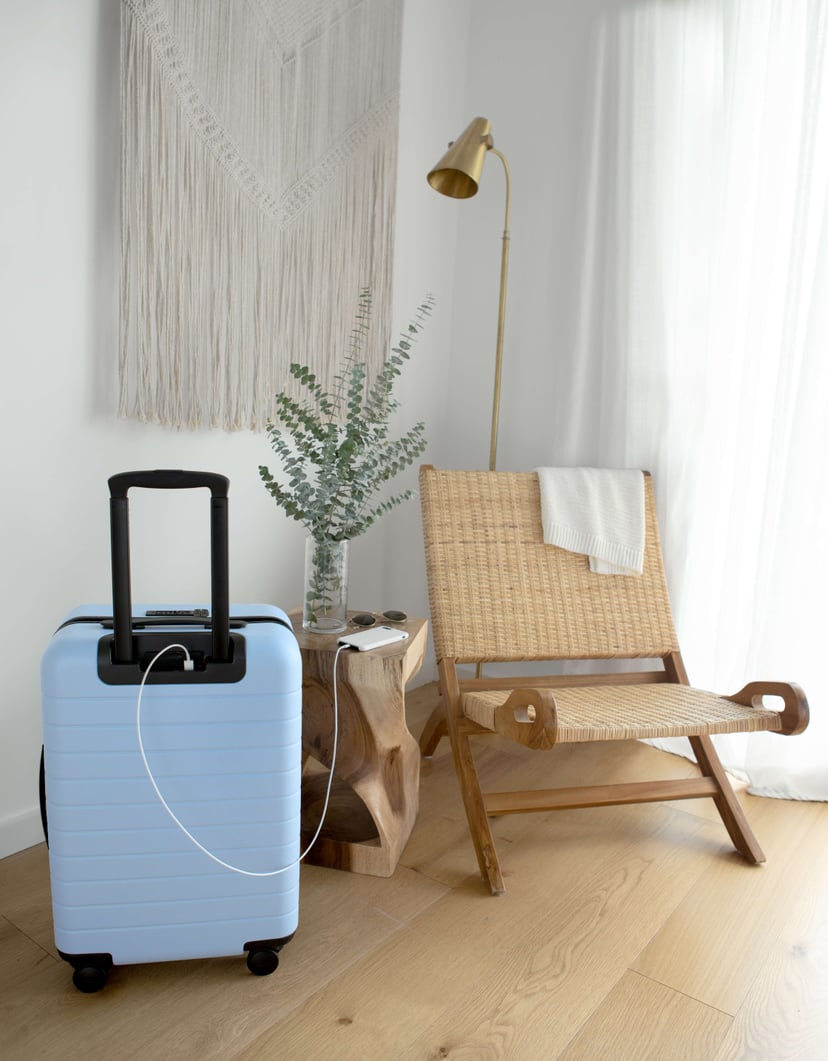 Away light blue best sale suitcase