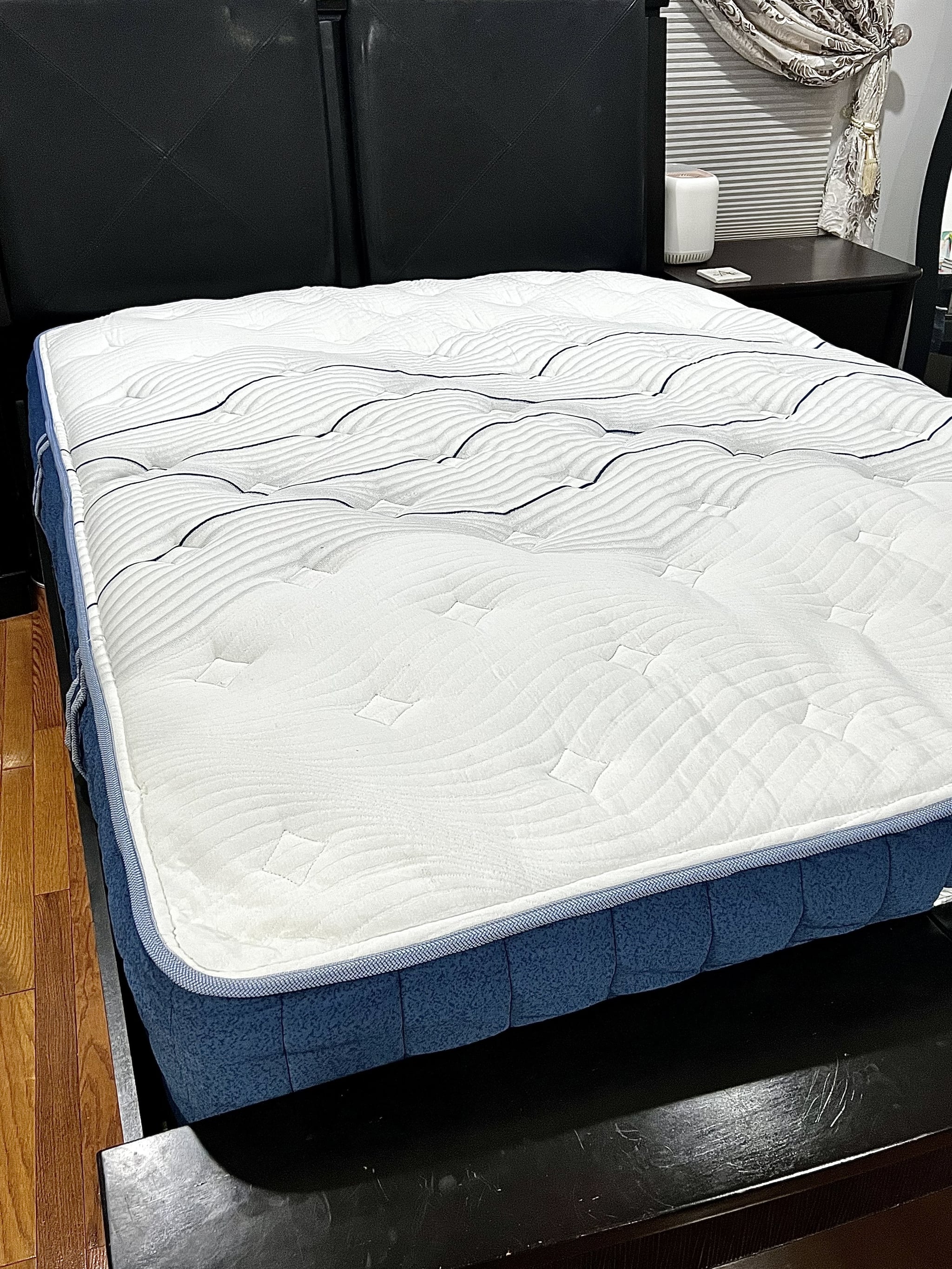 The Bear Elite Hybrid Mattress on a bed frame.