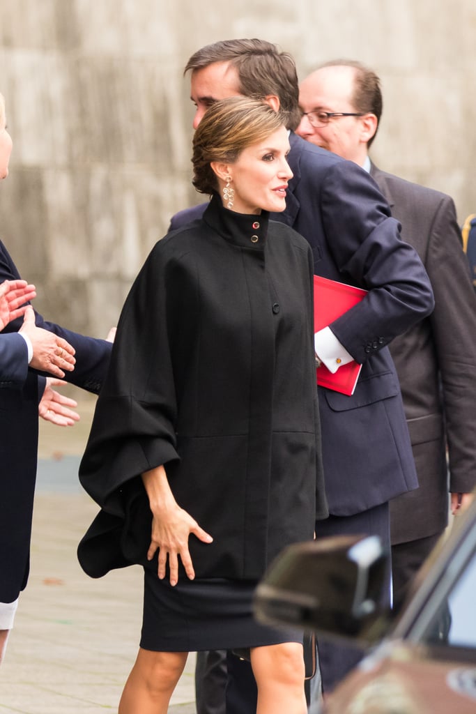 All eyes were on the queen's chic black cape while attending an art exhibition opening in Düesseldorf, Germany, in October 2015.