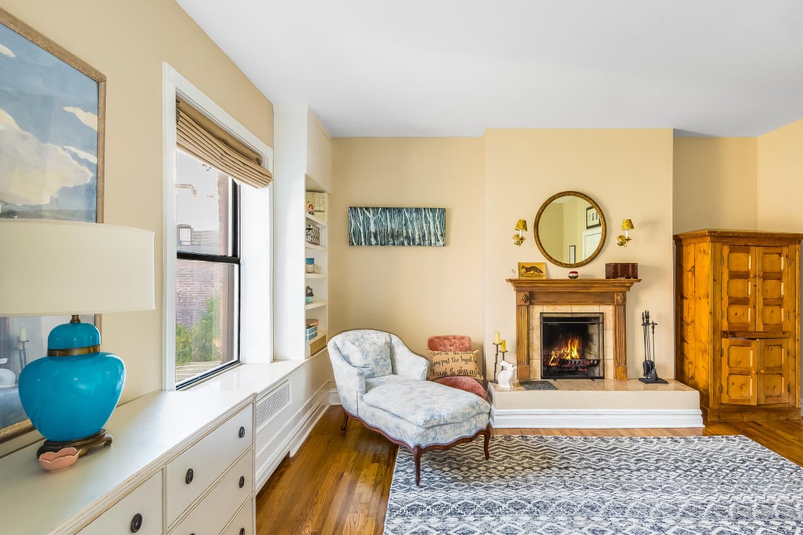 The Oversized Bedroom Features A Second Wood Burning Fireplace And