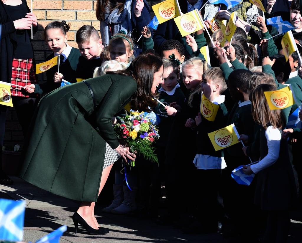 Kate greeted students outside Scotland's St. Catherine's Primary School and looked at the work of the children's mental health charity Place2Be in February 2016.