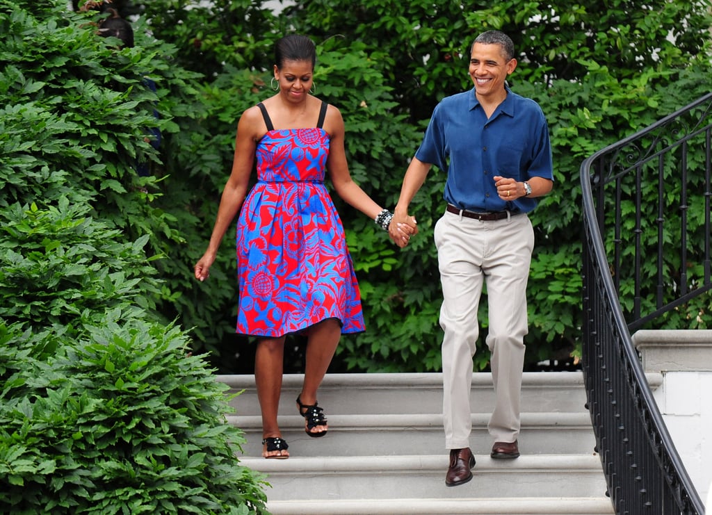 A patriotic Michelle and Barack walked hand in hand in 2011.