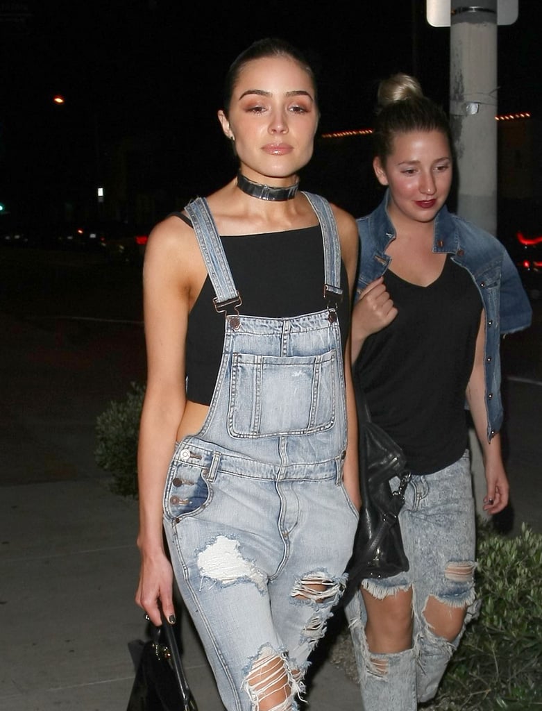 The star kept cool by wearing a black crop top underneath. And we can't forget that choker! Sleek and silver.