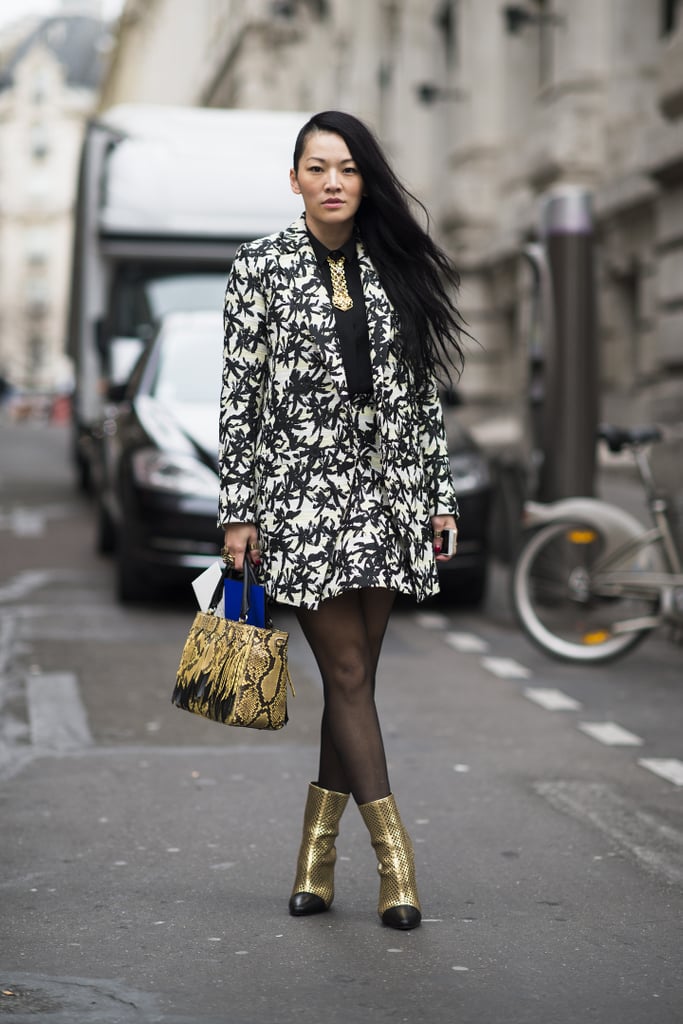 She may have borrowed from the boys up top, but that print and those metallic booties are all woman. 
Source: Le 21ème | Adam Katz Sinding