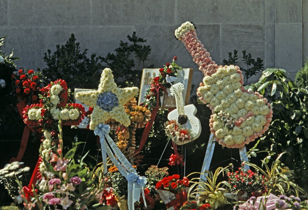 Flower arrangements in the shapes of guitars, crosses, and stars were scattered throughout Memphis.