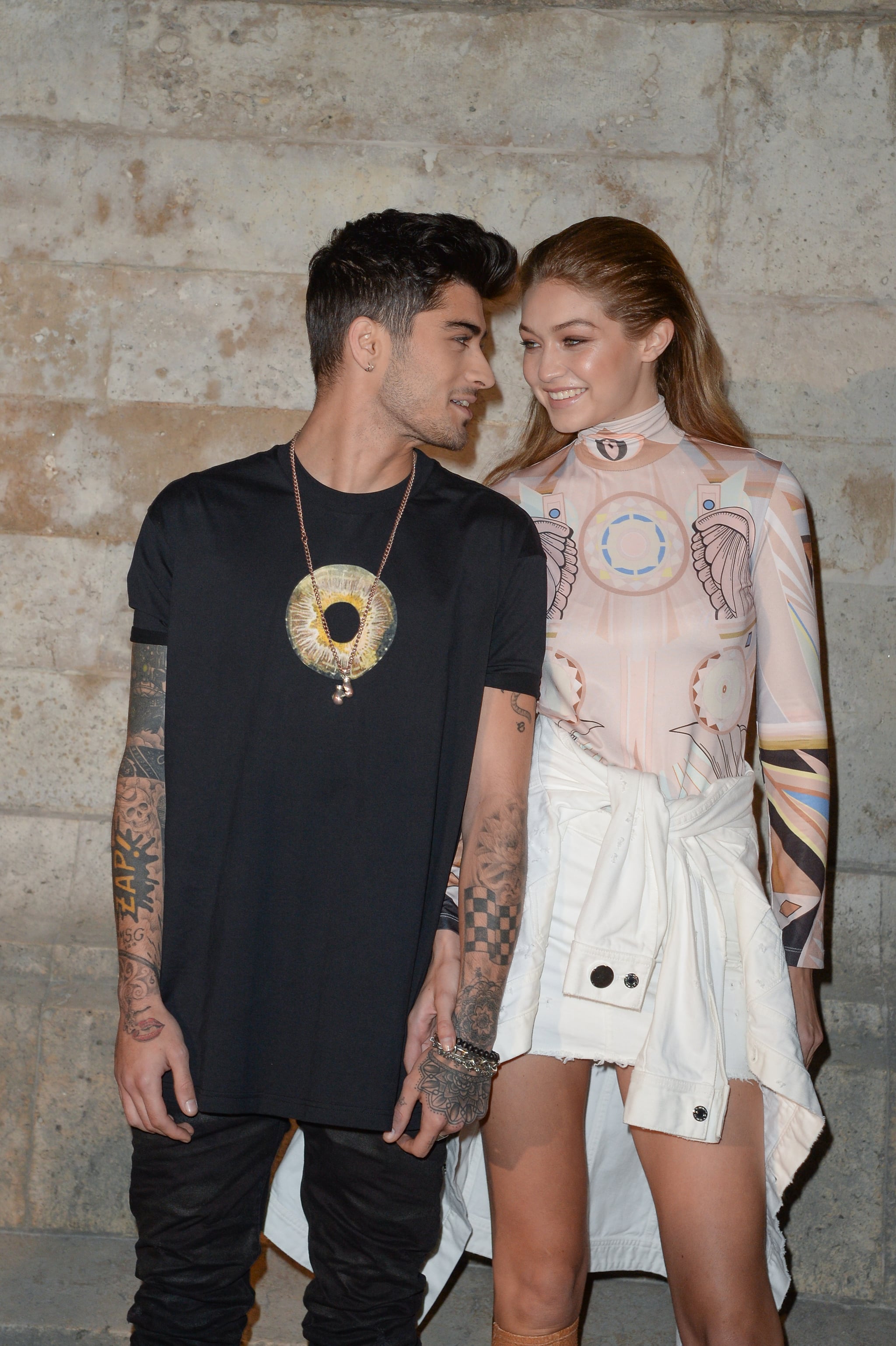 PARIS, FRANCE - OCTOBER 02:  Zayn Malik and Gigi Hadid attend the  Givenchy show as part of the Paris Fashion Week Womenswear Spring/Summer 2017on October 2, 2016 in Paris, France.  (Photo by Stephane Cardinale - Corbis/Corbis via Getty Images)