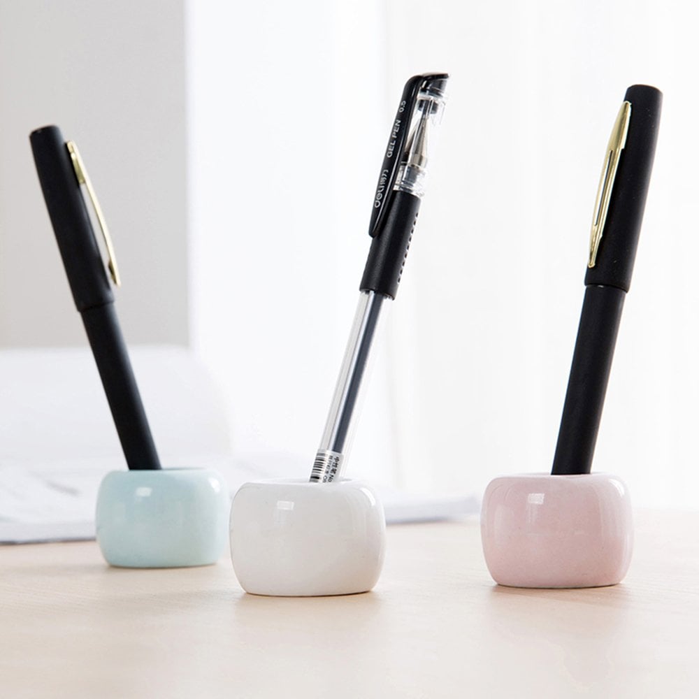 Probably the coolest part is that the Airmoon Mini Ceramics Handmade Toothbrush Holder ($10, pack of two) doubles as a pen holder.