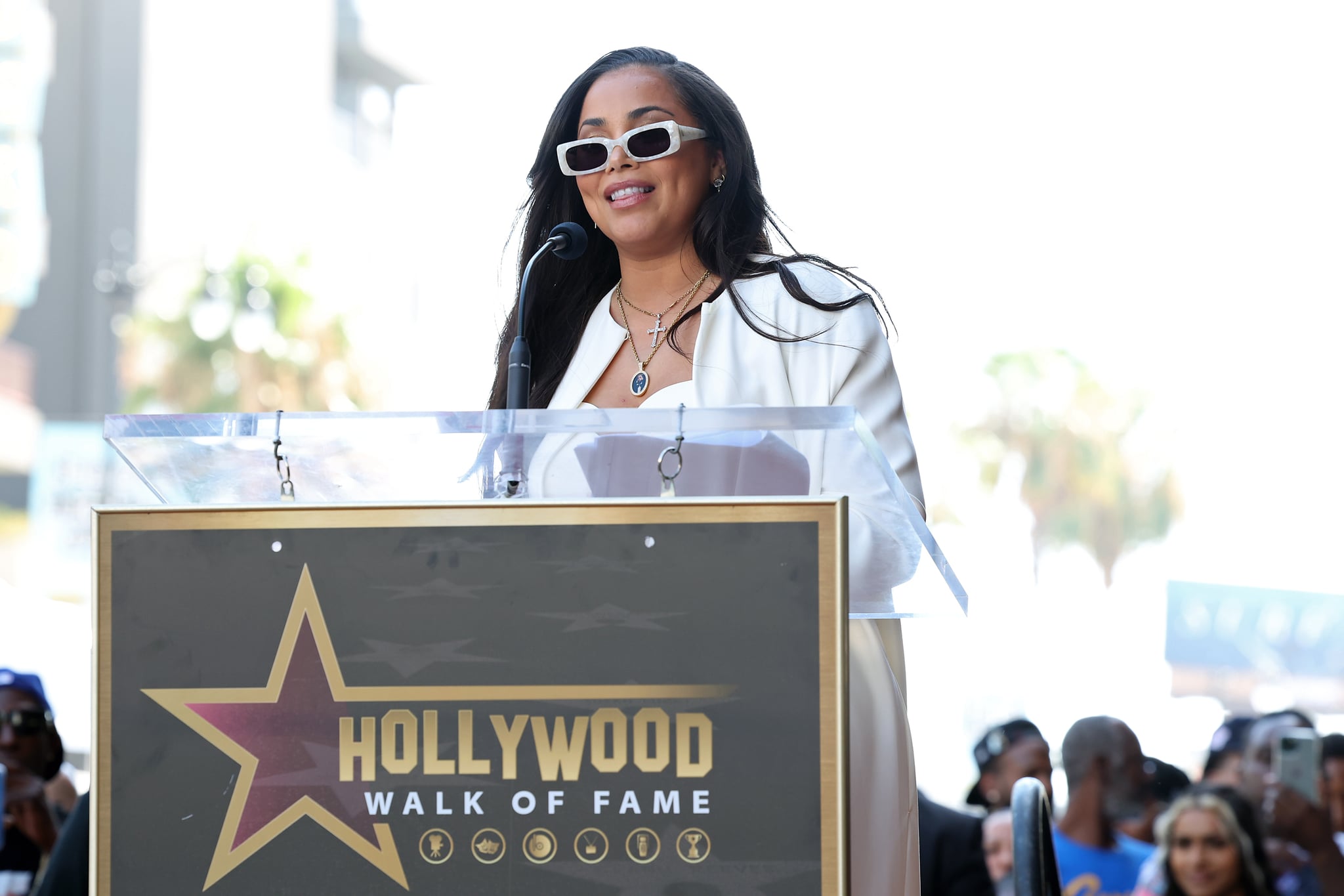Lauren London speaks onstage as Nipsey Hussle is posthumously honored with a star on The Hollywood Walk of Fame.