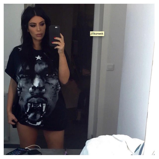 Kim Wore a Black Oversize T-Shirt Printed With a Graphic of Kanye's Face