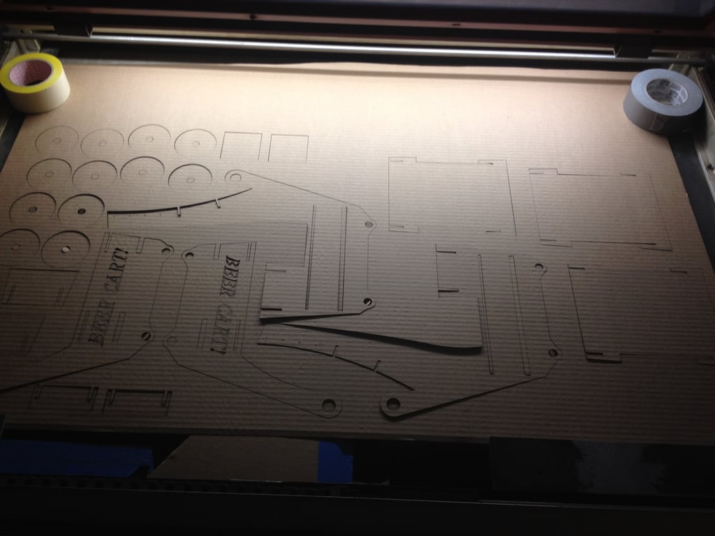 A laser cutter precisely cut all the cardboard pieces in just 20 minutes.