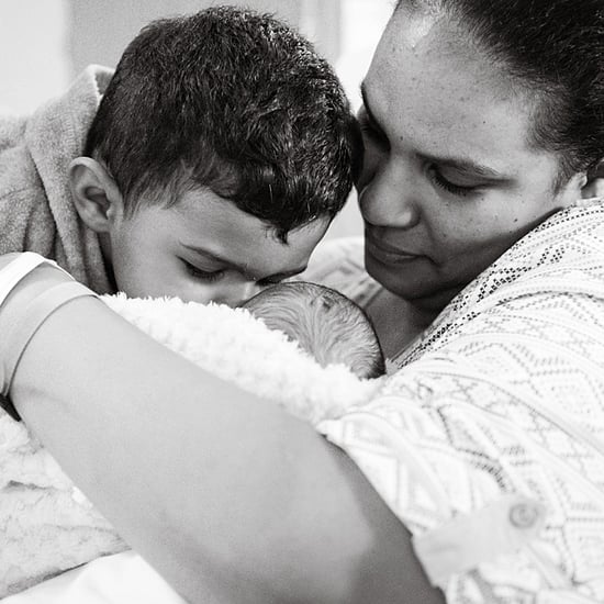 Birth Photos and Sibling Meeting Baby