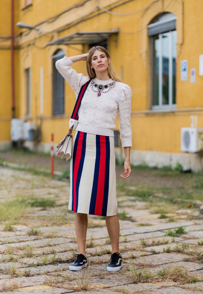 With a Striped Midi Skirt, Sweater, and Chunky Jewellery