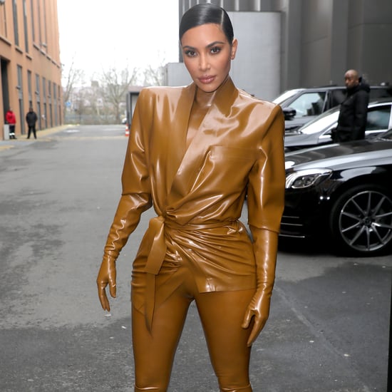 Watch Kim Kardashian Squeeze Into Her Latex Balmain Outfit
