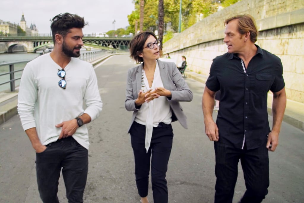 Walking down the streets of Paris, Efron appears casual in a white T-shirt and jeans. The sunglasses on his neck are a vibe, too.