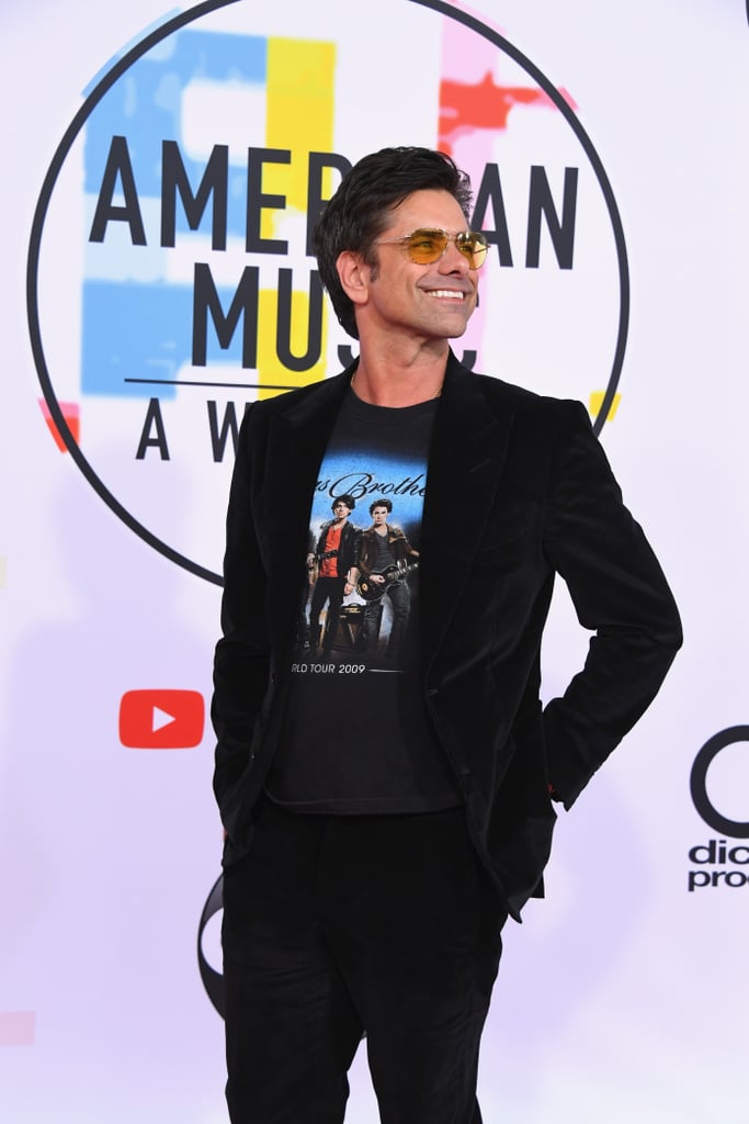 John Stamos Wearing Jonas Brothers T-Shirt at 2018 AMAs