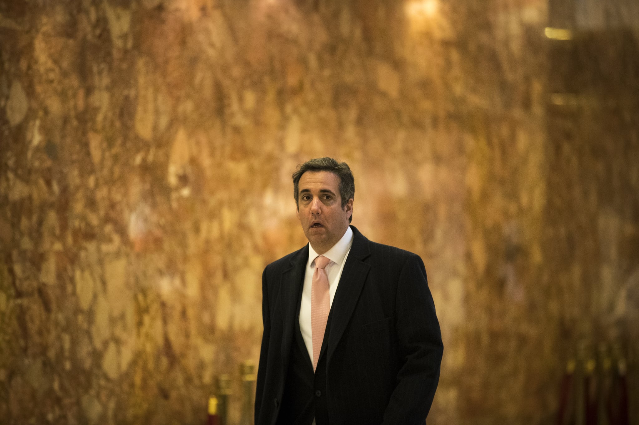 NEW YORK, NY - JANUARY 12: Michael Cohen, personal lawyer for President-elect Donald Trump, walks through the lobby at Trump Tower, January 12, 2017 in New York City. Trump and his transition team are continuing the process of filling cabinet and other high level positions for the new administration. (Photo by Drew Angerer/Getty Images)