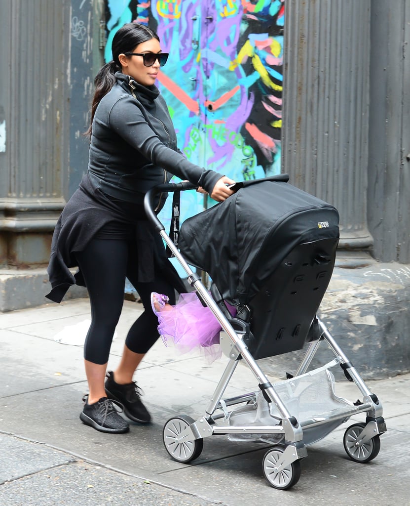 Strolling around SoHo with "princess" North, Kim gave the athleisure look a try.