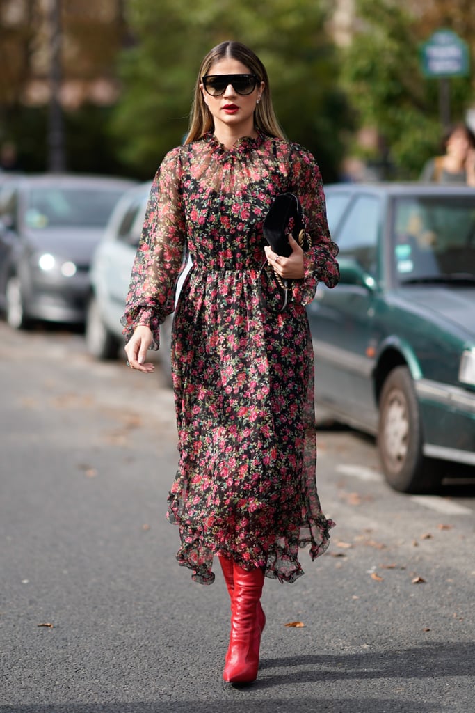 Thassia Naves pulled an easy styling hack by matching her boots to one of the colors in her floral dress.