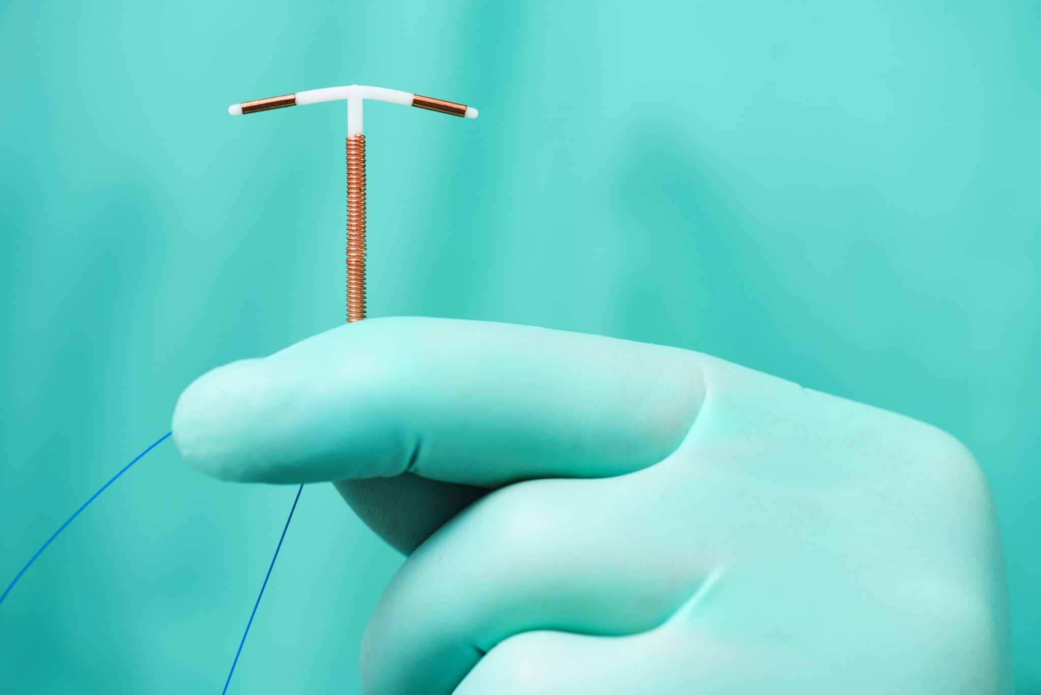 Doctor holding IDU device.