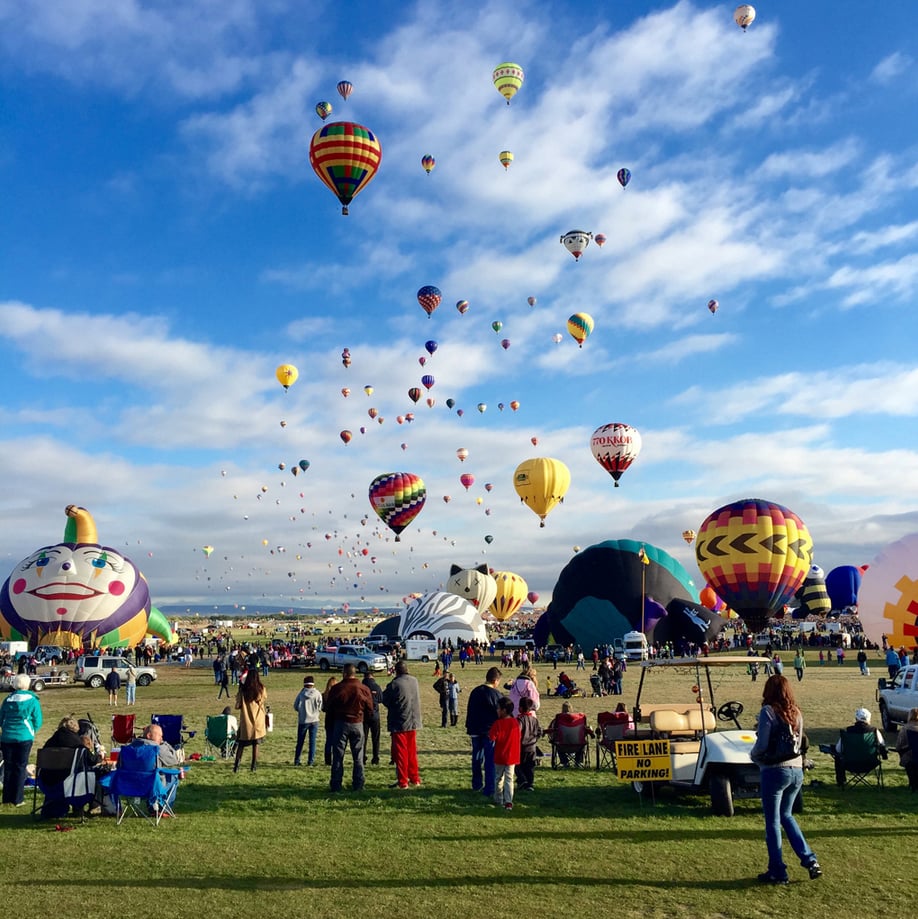 "When photographing a flat landscape, focusing on foreground elements — like the partially inflated balloons in this photo — helps create greater depth of field."