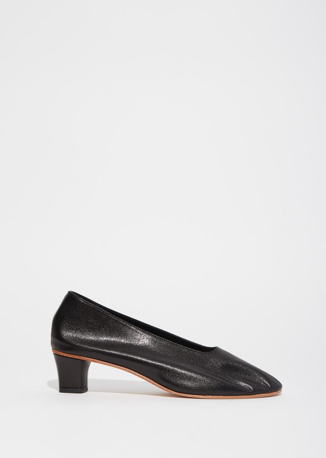 Opt for these simple black Martiniano High Heeled Glove Slippers ($548).