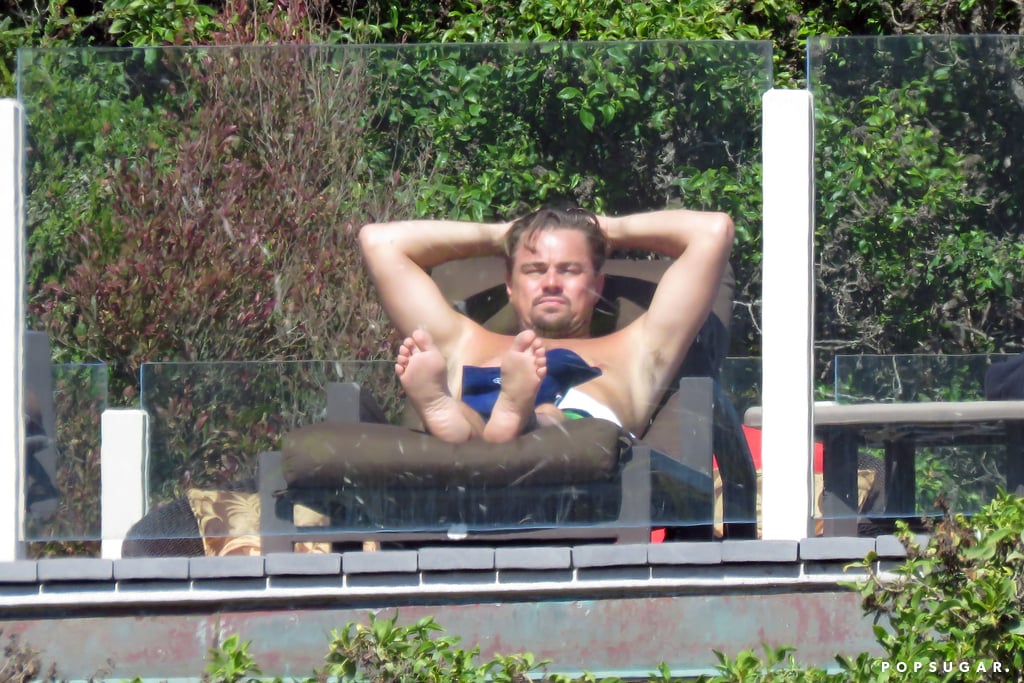 When He Was Lounging Shirtless by the Pool but All We Could Notice Was How Small His Feet Look