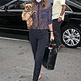 She made impeccable polish seem entirely easy — something not easy to do — with a sheer Equipment button-up, slim pants, and pointed-toe pumps while out and about in NYC.