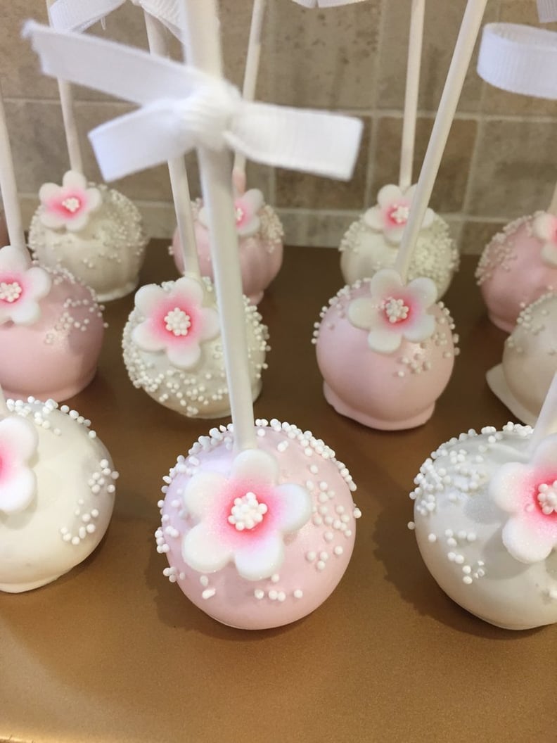 Pink and White Flower Cake Pops With Sprinkles