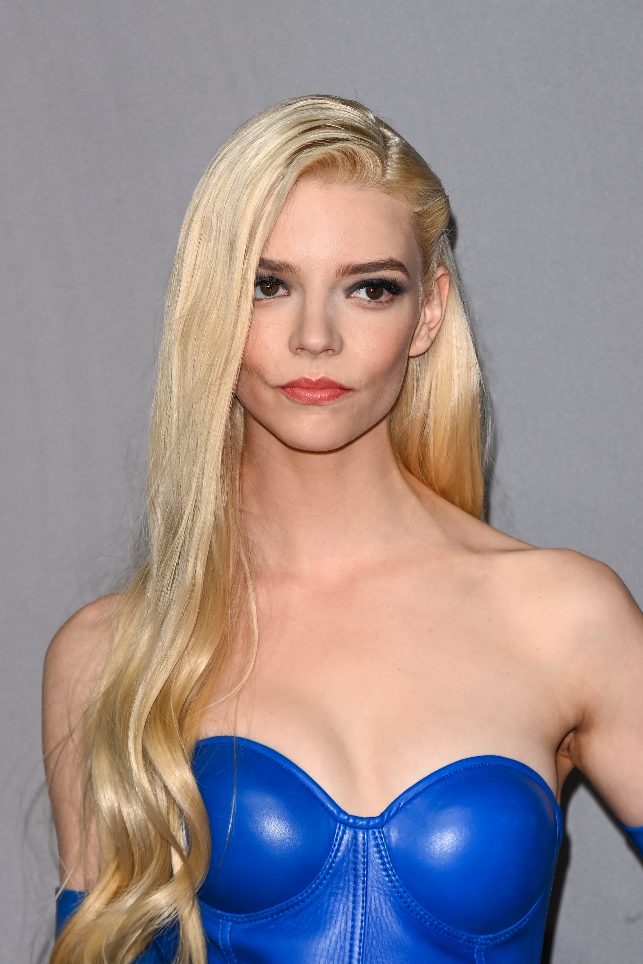 Anya Taylor Joy Goes Strapless In A Blue Latex Dress At The 'Menu' Premiere
