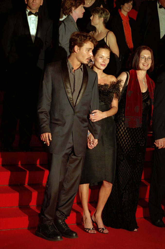 When She Held His Arm as They Posed For the Camera