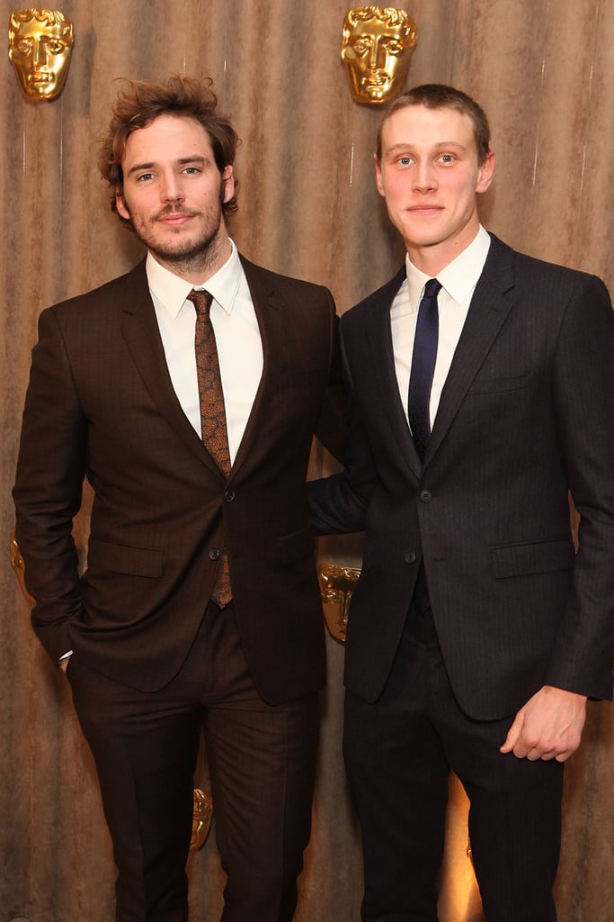 Sam Claflin and George Mackay buddied up at a Burberry/BAFTA party in 2014.