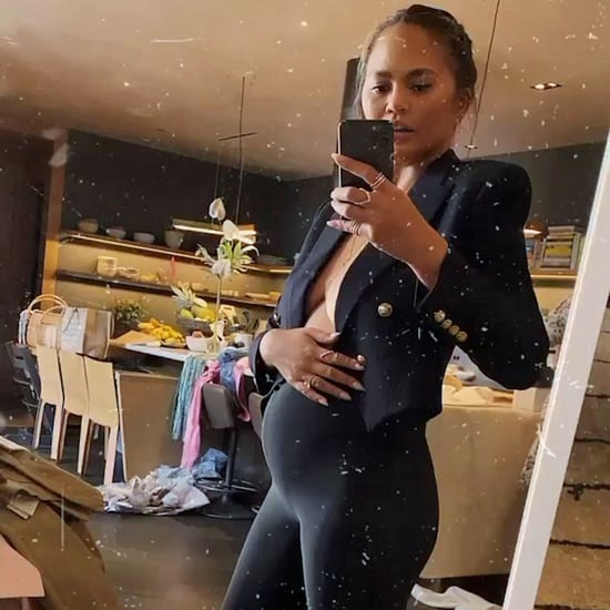 Chrissy Teigen Shows Her Baby Bump in Leggings and a Blazer