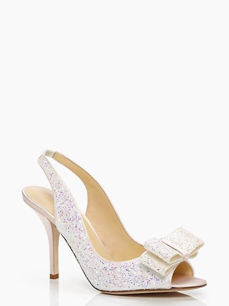 Kate Spade New York White Glitter Charm Bow Peep-Toe Heels ($129, originally $328)