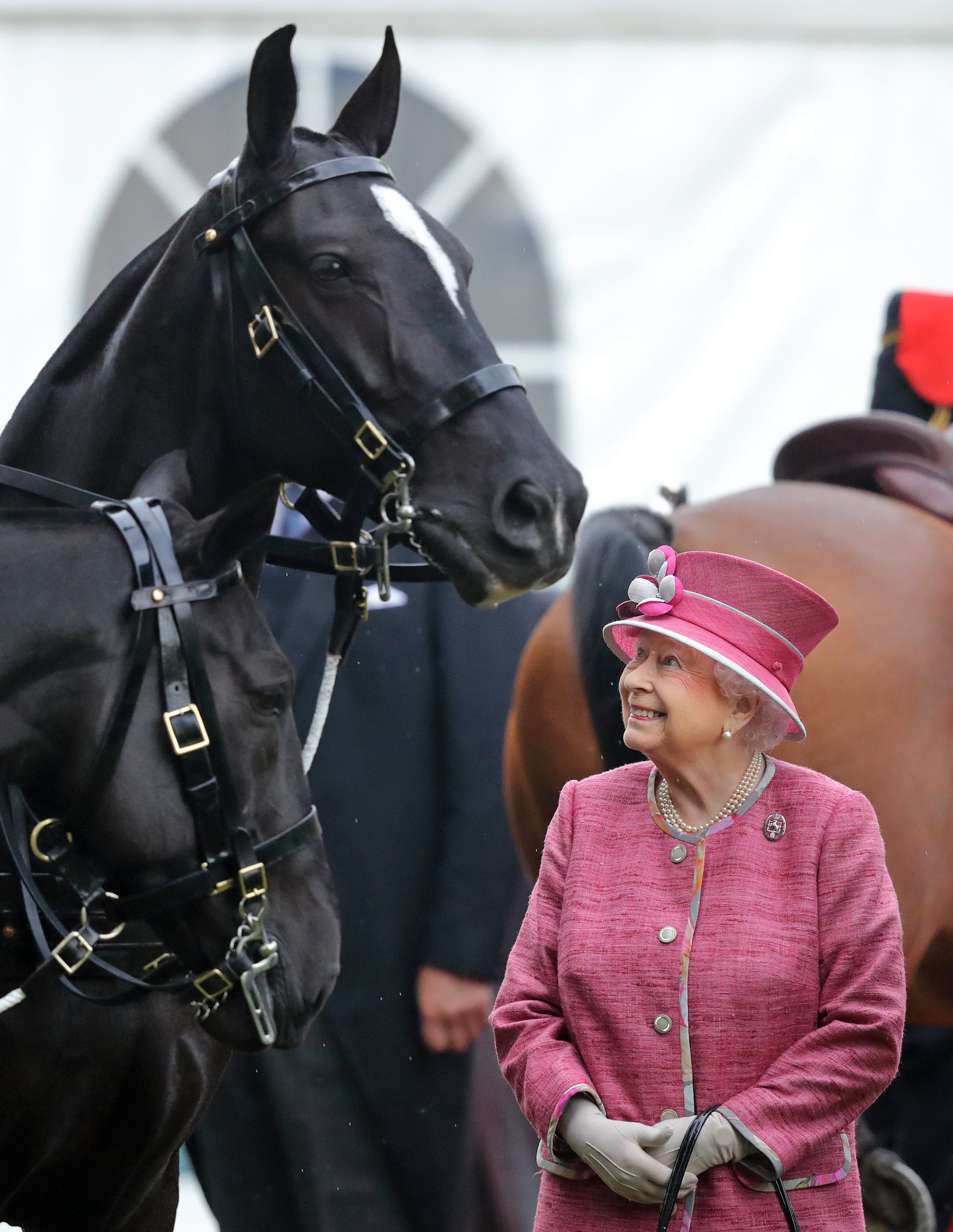 LONDON, UNITED KINGDOM - OCTOBER 19: (EMBARGOED FOR PUBLICATION IN UK NEWSPAPERS UNTIL 48 HOURS AFTER CREATE DATE AND TIME) Queen Elizabeth II reviews the King's Troop Royal Horse Artillery during their 70th anniversary parade in Hyde Park on October 19, 2017 in London, England. The King's Troop Royal Horse Artillery (KTRHA) was formed by King George VI in October 1947 and are commonly known as the 'Gunners'. (Photo by Max Mumby/Indigo/Getty Images)