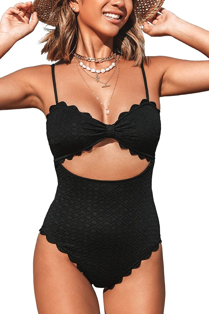 Cupshe One-Piece Swimsuit ($33, originally $45)
Treat your swimwear drawer to a welcomed refresh with this scalloped one-piece swimsuit from Cupshe. This suit is equal parts stylish and practical as it features adjustable straps and removable cups — making it a great option for those with larger busts. We also love the midriff cutout that's front and centre since it completes the swimwear with a sultry, skin-baring flair.