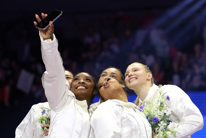 MINNEAPOLIS, MINNESOTA - JUNE 30: (L-R) Suni Lee, Simone Biles, Hezly Rivera, Jordan Chiles and Jade Carey pose for a selfie after being selected for the 2024 U.S. Olympic Women's Gymnastics Team on Day Four of the 2024 U.S. Olympic Team Gymnastics Trials