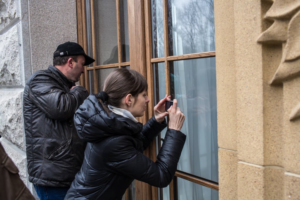 Visitors snapped pictures of the Mezhyhirya estate after it was abandoned by security.