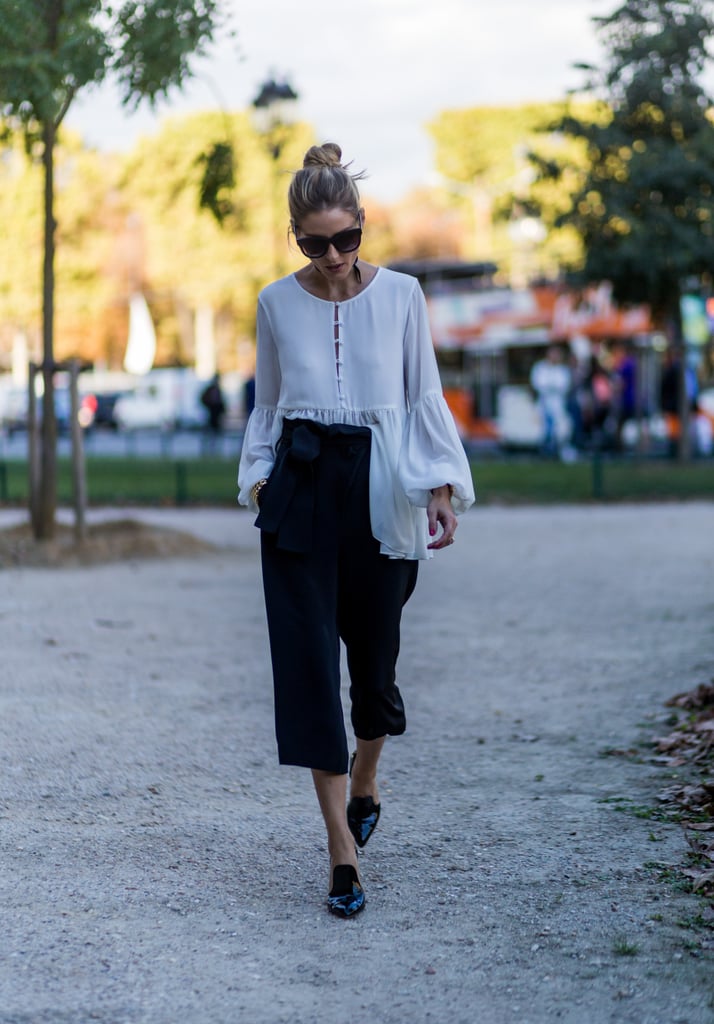 Hack: Half tuck a billowing top to attract all eyes to a paper-bag pant with a bow at the waist.