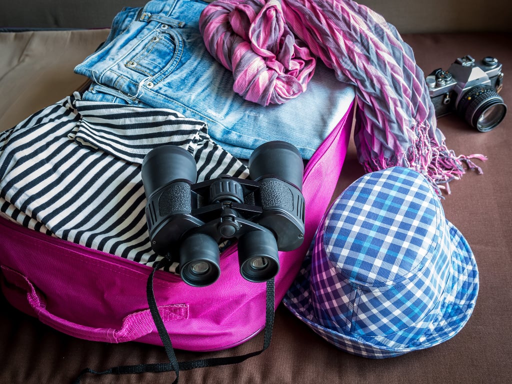 Remove a quarter of what you've packed.