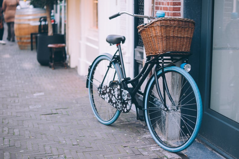 Riding a bike.