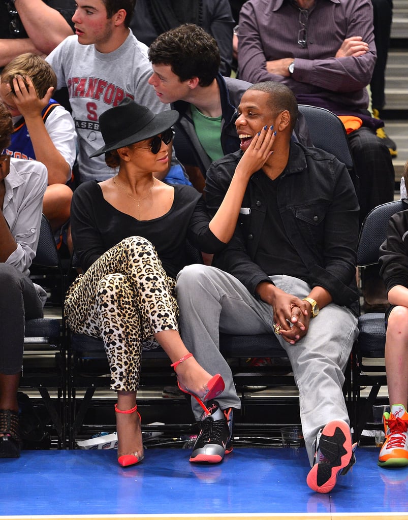 Beyoncé admired her man while wearing leopard-print A.L.C. pants and neon ankle-strap cap-toe Christian Louboutin pumps during a New York Knicks game in April 2012.