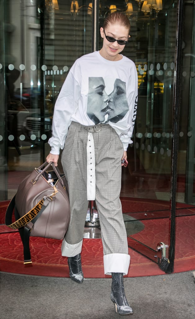 Gigi Hadid Wearing Top With Models Kissing