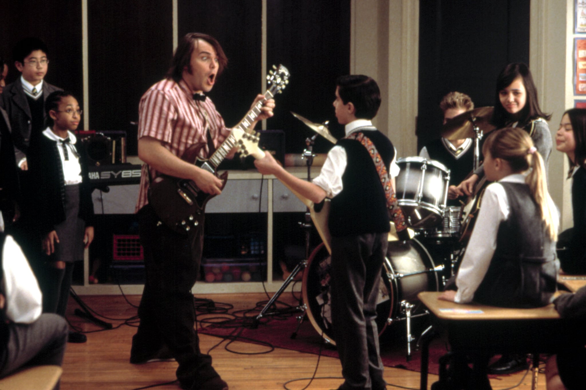 SCHOOL OF ROCK, James Hosey, Caitlin Hale, Maryam Hassan, Robert Tsai, Aleisha Allen, Jack Black, Joey Gaydos Jr., Kevin Clark, Veronica Afflerbach, Rebecca Brown, Miranda Cosgrove, 2003, (c) Paramount/courtesy Everett Collection