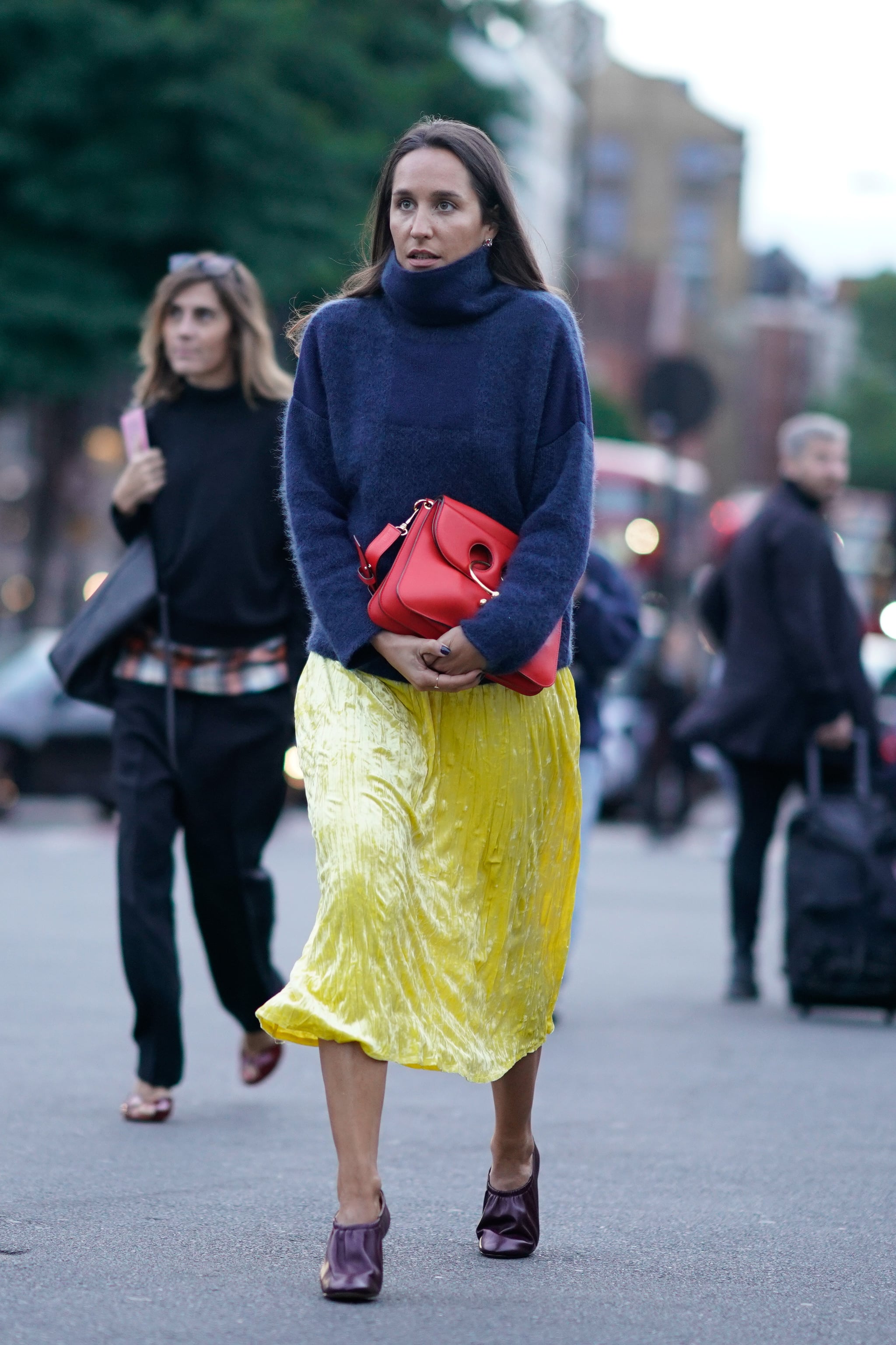Contrast Fabrics When You Throw a Wool Sweater Over Your Silk Slip and Wear Satin Booties