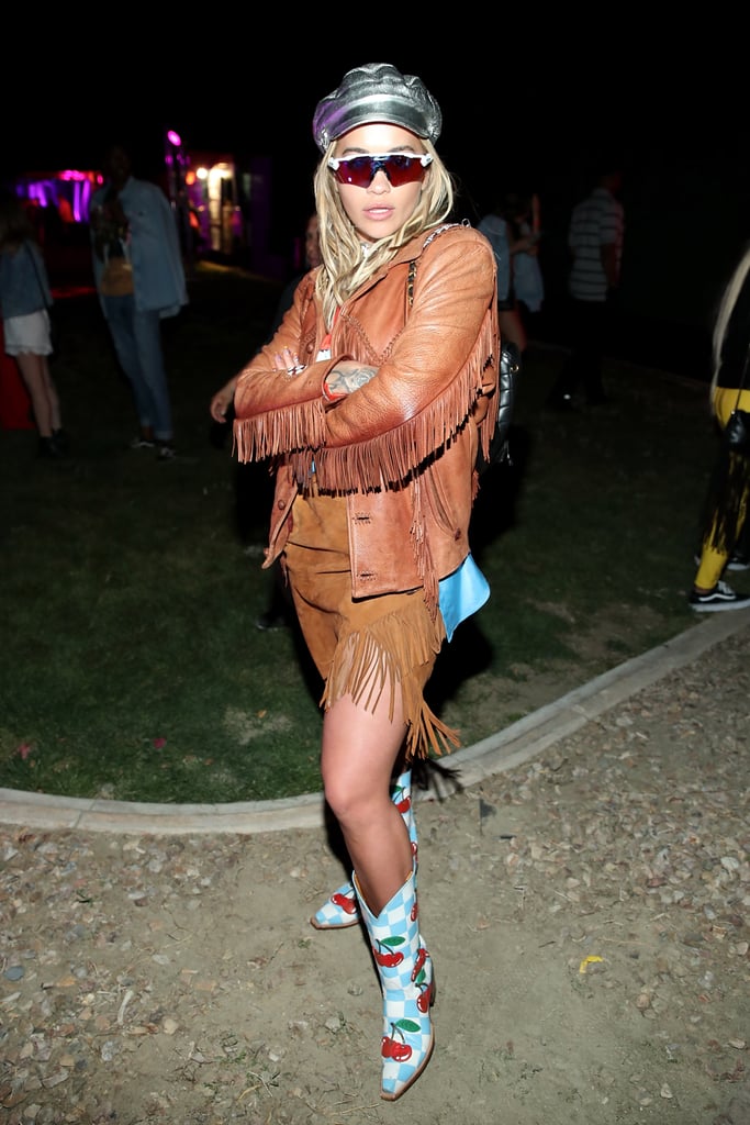 Rita Ora wearing a fringed outfit and cherry boots at the Nylon Midnight Garden After Dark party. 
