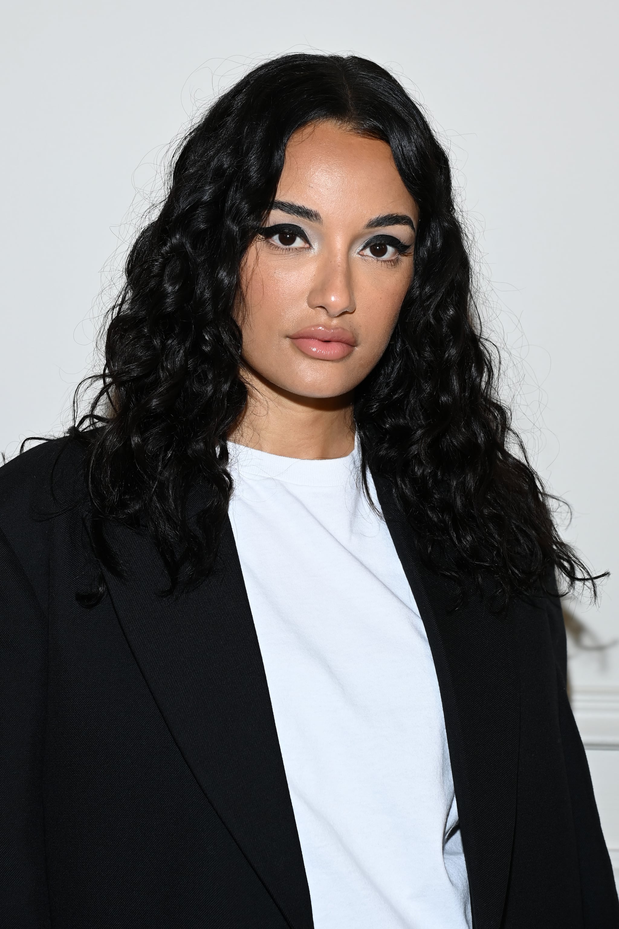 PARIS, FRANCE - JANUARY 26: (EDITORIAL USE ONLY - For Non-Editorial use please seek approval from Fashion House) Amina Muaddi attends the Valentino Haute Couture Spring/Summer 2022 show as part of Paris Fashion Week on January 26, 2022 in Paris, France. (Photo by Pascal Le Segretain/Getty Images)