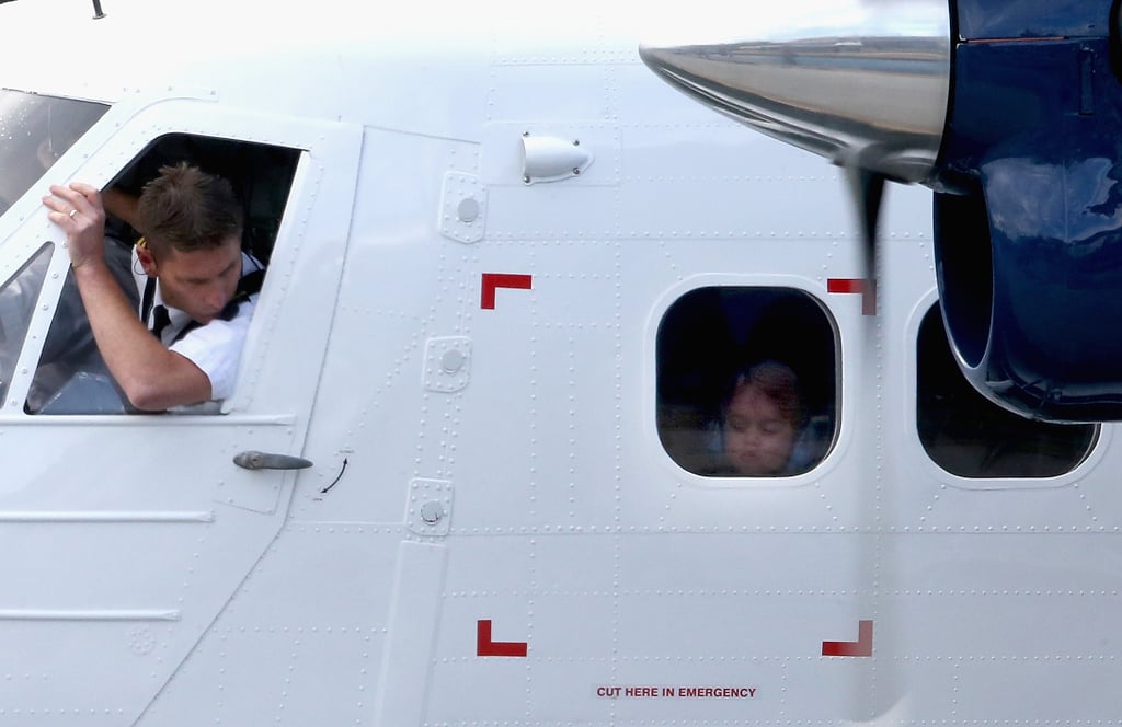 Prince George's Face Against Plane Window in Canada Pictures