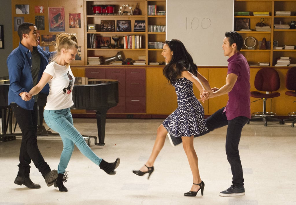 Jake (Jacob Artist), Brittany (Heather Morris), Santana (Naya Rivera), and Mike (Harry Shum Jr.) perform on the "100" episode of Glee.