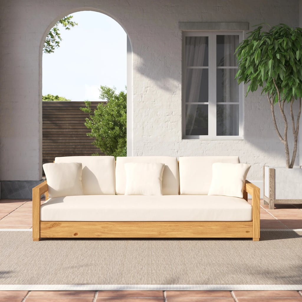 An Outdoor Sofa: Ortega Wide Outdoor Teak Patio Sofa With Cushions