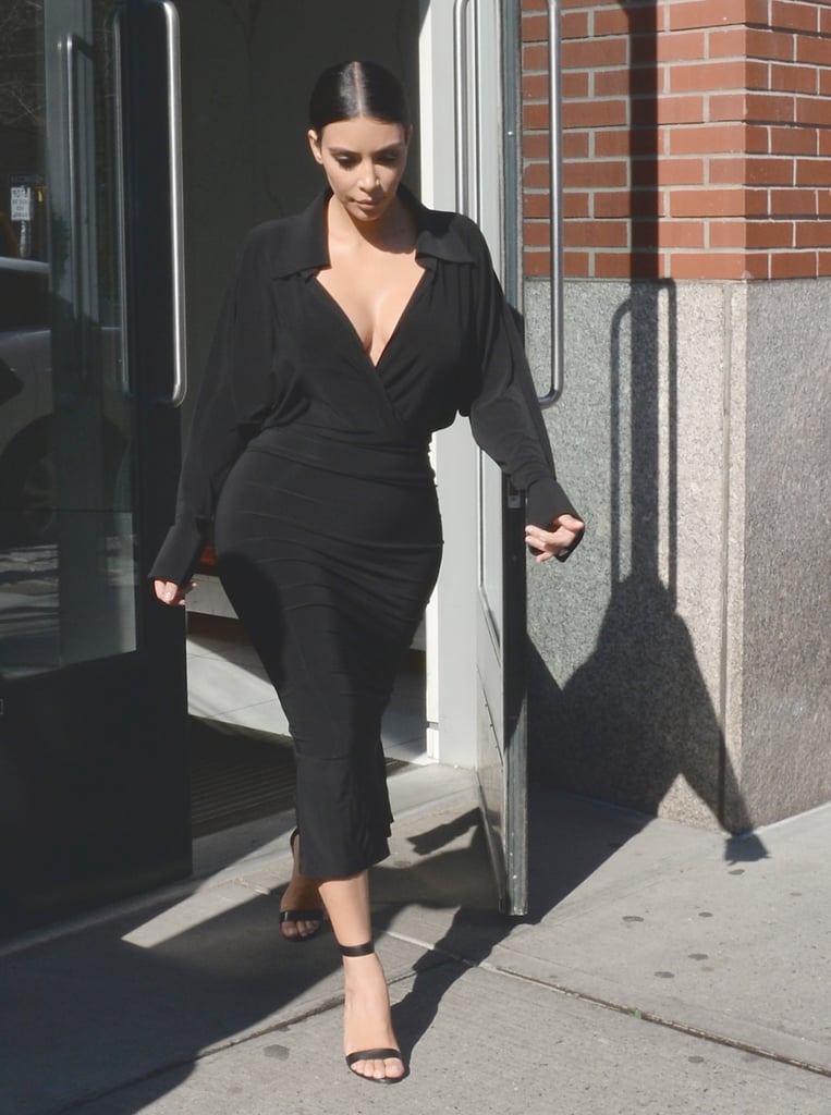 The tucked-in top highlighted her tiny waist while the skirt hugged in all the right places.